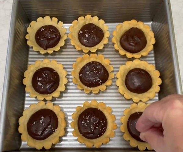 Mini Chocolate Tarts Sprinkle Sea Salt Over Chocolate